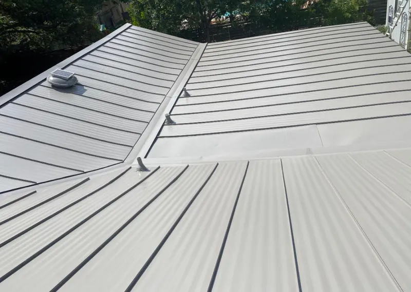 Solar attic fan installed on a metal roof for Roof Ventilation in Boiling Springs